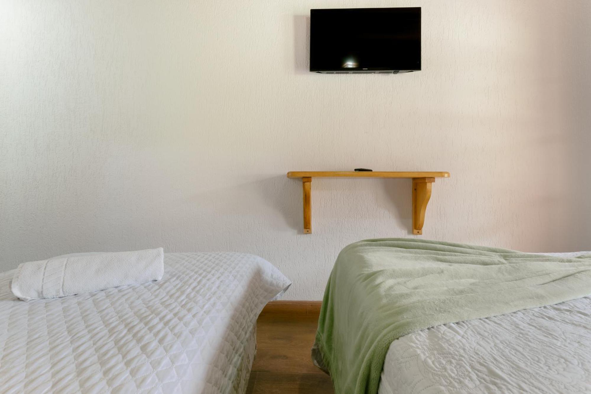 Velinn Pousada Vila Floratta Campos do Jordão Habitación foto